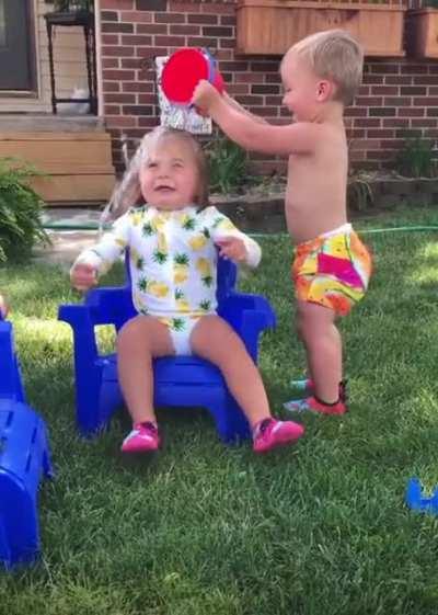 Oh look brother brings me a bucket of water