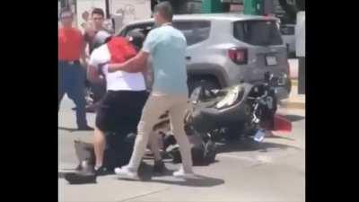 Civilian beating a motorcycle cop