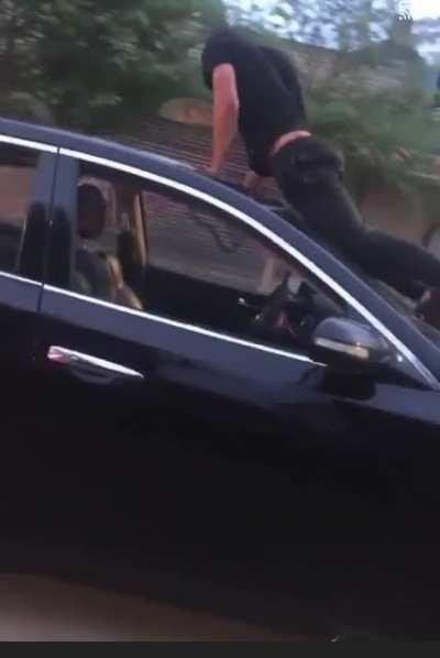 Humping your windshield, on a moving vehicle, in front of a cop car