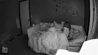 Everyone was asleep in the house, but something told me to check my daughter’s monitor. She was sleeping, then sat up and stared at the door. The background noise is her sleep sounder. Around the 10 second mark there is a strange noise. Can anyone help de