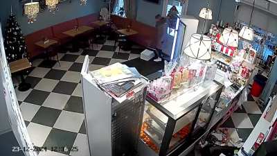 A rampaging valkyrie in a fluff jacket vandalized a cafe