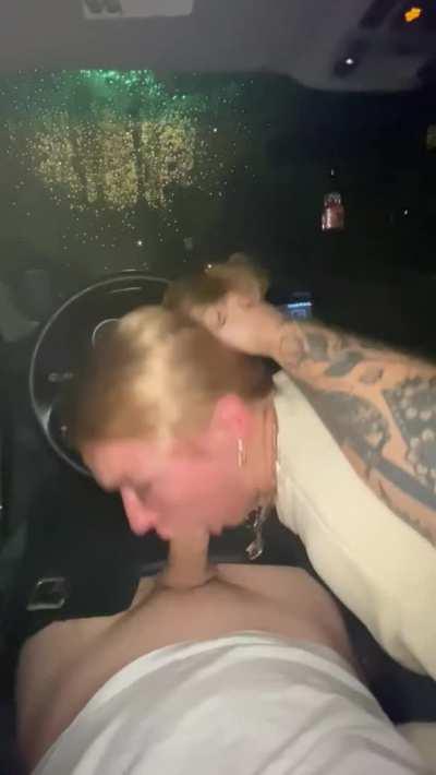 Giving him a blowjob in the car