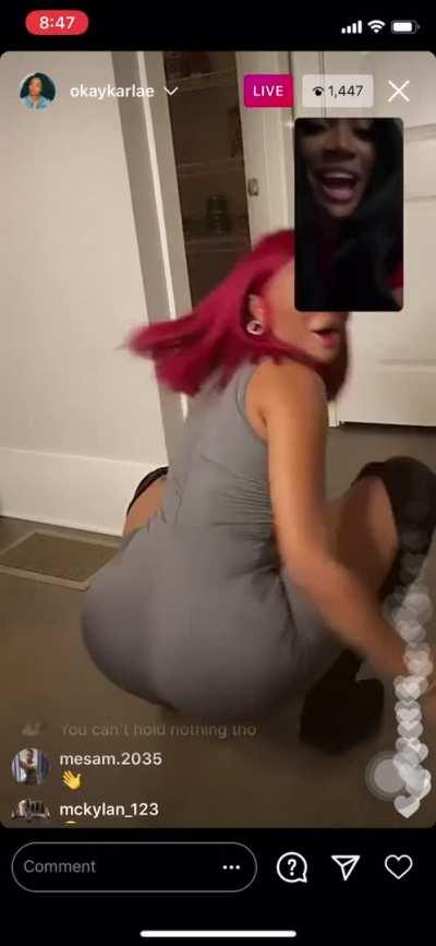 Karlae watching herself twerk