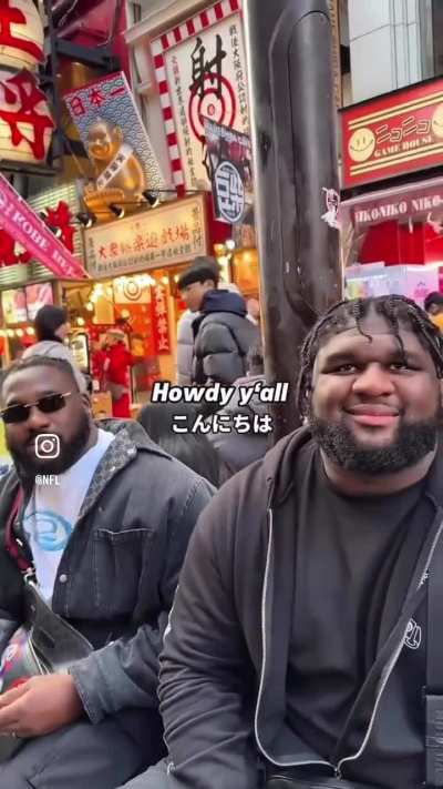 This interaction between L.J. Collier and Dalvin Tomlinson with Kunie the photographer is amazing!