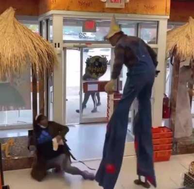 Scarecrow drops a shopper