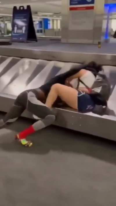 Rumble on the luggage carousel. Happened yesterday at O'Hare airport.