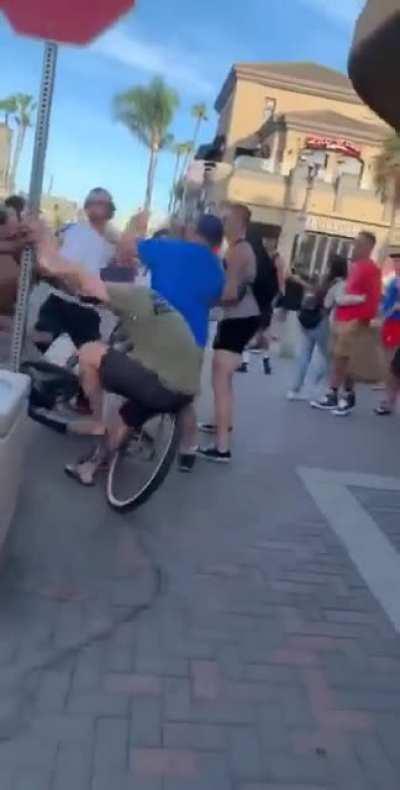 Guy screams “fuck you” to protesters then proceeds to have his reset switch bopped