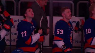 104 yr old WW2 Veteran performs the national anthem on saxophone.