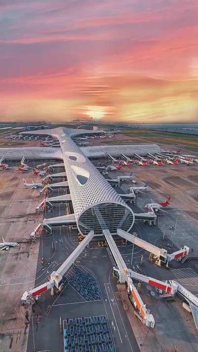 Shenzhen airport. Handles 200,000+ visitors on holidays.