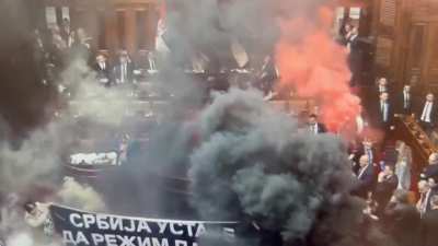 Serbia's parliament descended into chaos as opposition MPs from the 