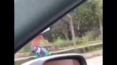 Man carries a fridge on his bicycle!