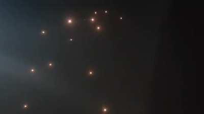 Iron Dome firing dozens of interceptors at an unprecedented Hamas rocket attack on Tel Aviv