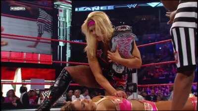 Beth stroking Eve's face