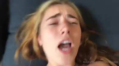 Spits on her own face