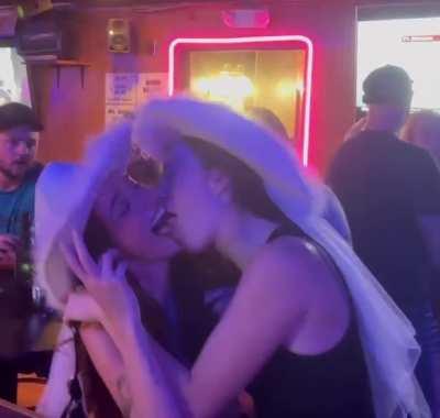 Touching tongues at the bar