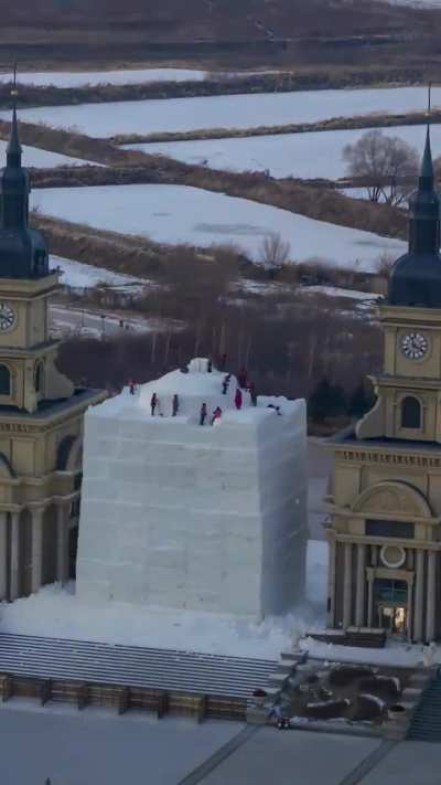 Giant snowman in Harbin, China, 19 meters (62 feet) tall and carved out of over 3,500 cubic meters of snow
