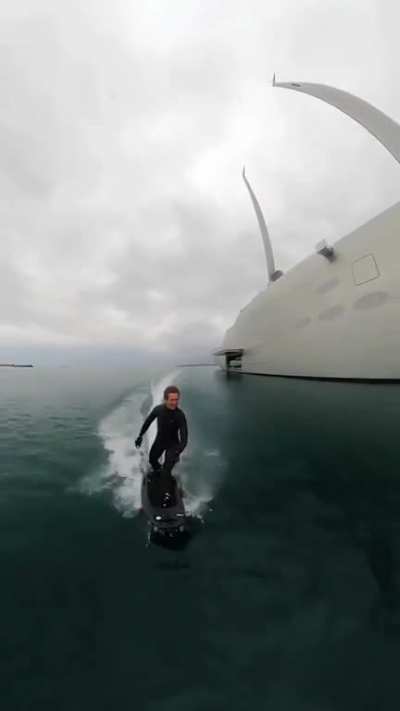 Jetboarding alongside Sailing Yacht A