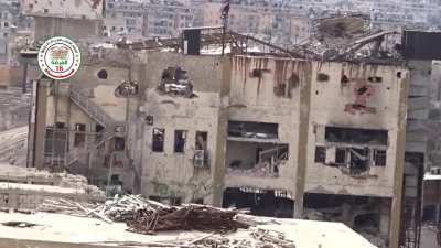 FSA 16th Division using an improvised tube cannon to lob explosives into Syrian Army controlled buildings - al-Khalidiya, Aleppo - 6/7/2015