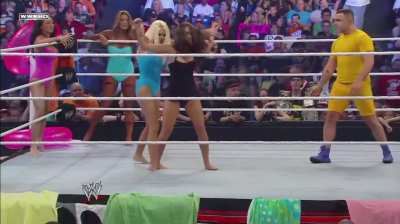 Nikki Bella hitting Jillian Hall with her ass