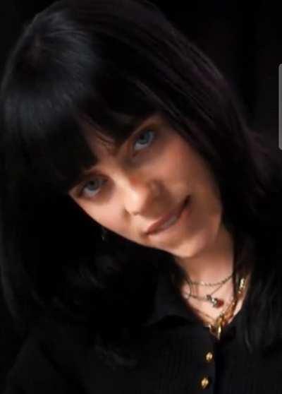 Billie Eilish lip bite and stare