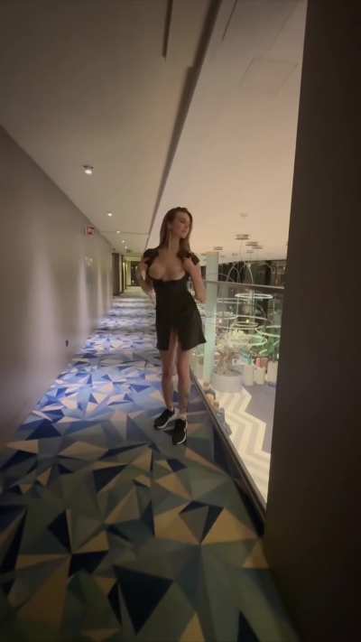 Above reception and in front of entrance