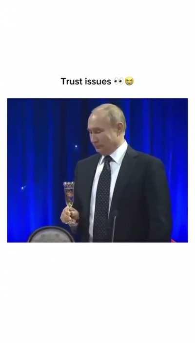 RU POV: Putin and his benefactor attempt to make a toast on their new cooperation.