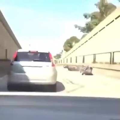 Kicking a moving car