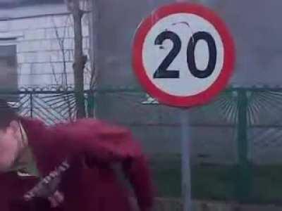 Punching a traffic sign