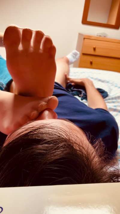 she spreads her toes so he can inhale her deepest scent