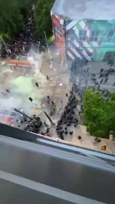 Police pepper spray and tear gas protestors