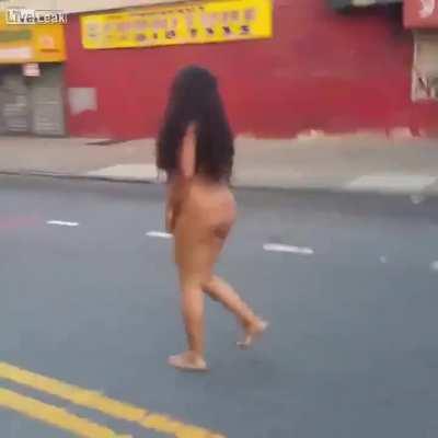 Tweaking woman in Bronx rolling around in the street with great commentary