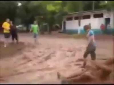 black scary man comes from mud