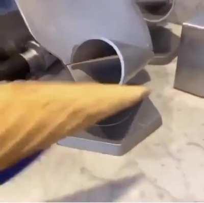 This is how waffle ice cream cones are created.