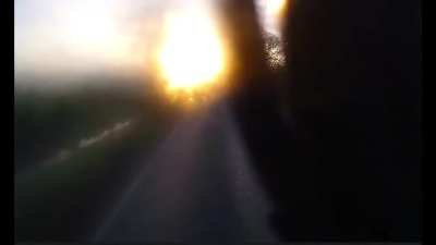 Driving with a fogged window in low sun