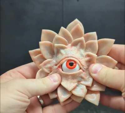 all seeing flesh flower