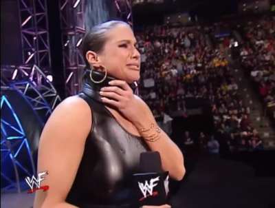 Stephanie McMahon black leather neck brace