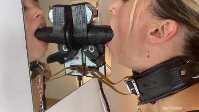 Daddy made a new toy to help me learn how to deepthroat! Everytime I deepthroat and touch the pedal with my chin a vibrator strapped to my clit buzzes harder and when I give up and move away [F]rom the dildo it shuts the vibrator off!