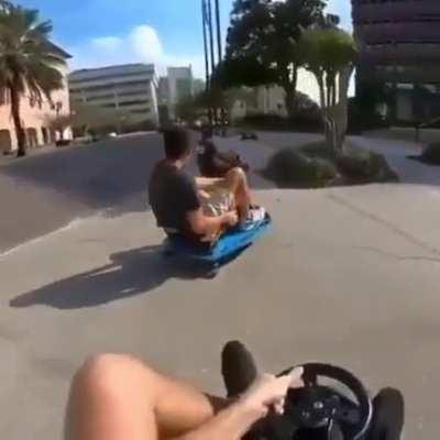 Dudes playing Mario Kart IRL