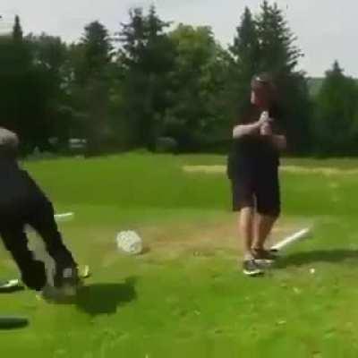 Walking behind the golfer while he is taking his shot, bad idea