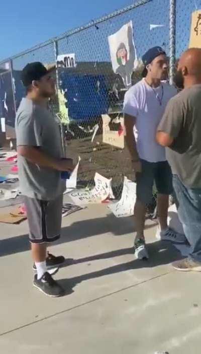 dark skinned white guy offends light skinned black guy