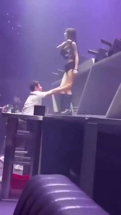 Dancer gives creep a face full of boot.