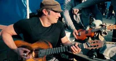 Sequel to Robert Rodriguez playing the guitar with Baby Yoda