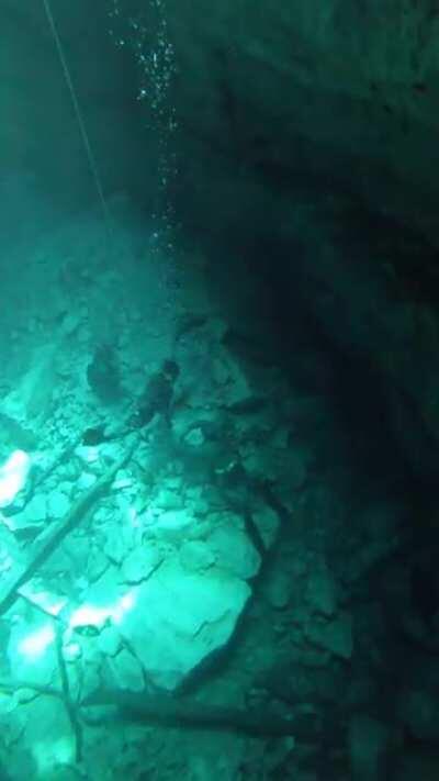 Sinking into a 170’ deep sinkhole on one breath.