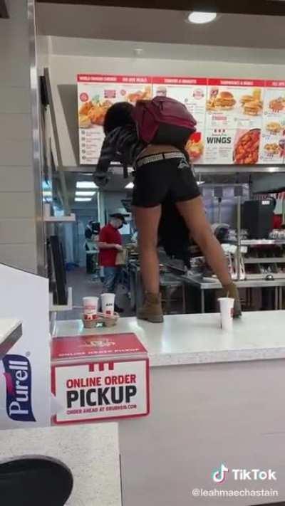 Karen jumps up onto counter, threatens, employees..