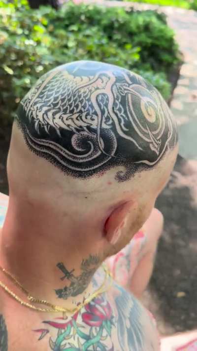 Here’s a dragon I drew on and tattooed on a human head. Find me @jasontylergrace in Portland, OR