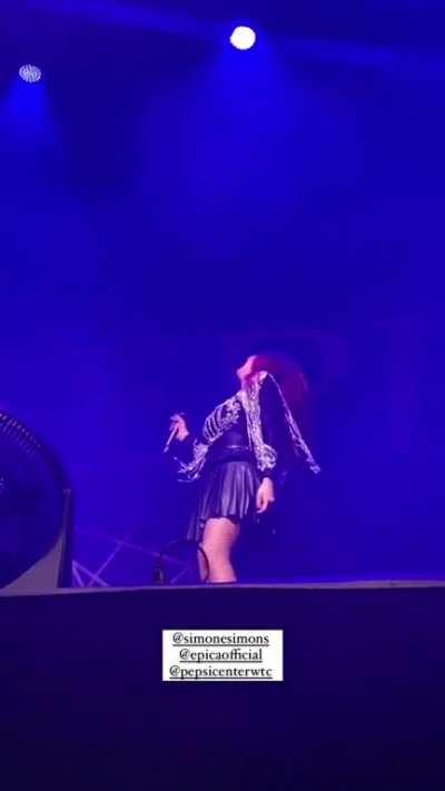 Simone Simons dancing.