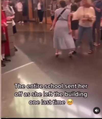 A beautiful moment where this teacher was clapped out by the entire school