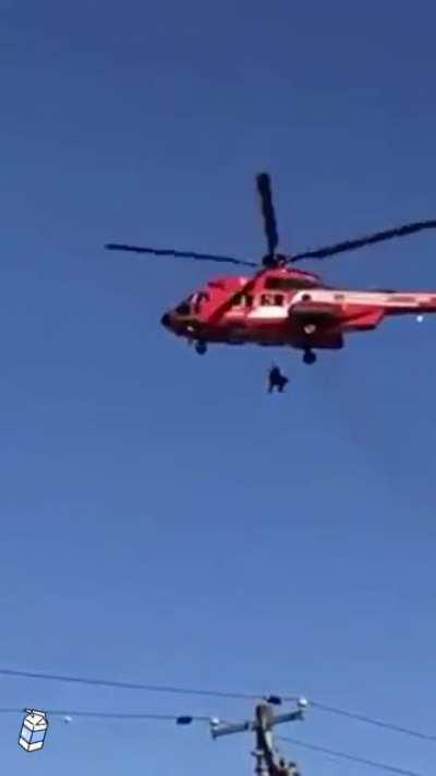 Rescuers Drop Woman.