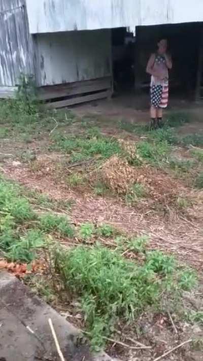 Trying to one hand a deer slug.