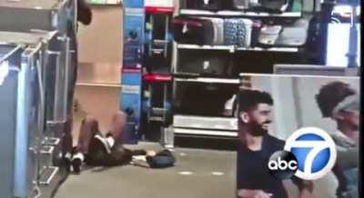 Cheeto-eating menace sucker punches someone and steals their phone inside a Best Buy.
